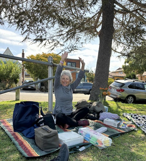 Nanci and Rebecca teaching a music class in the park